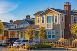 Residential Houses with cars on the parking space